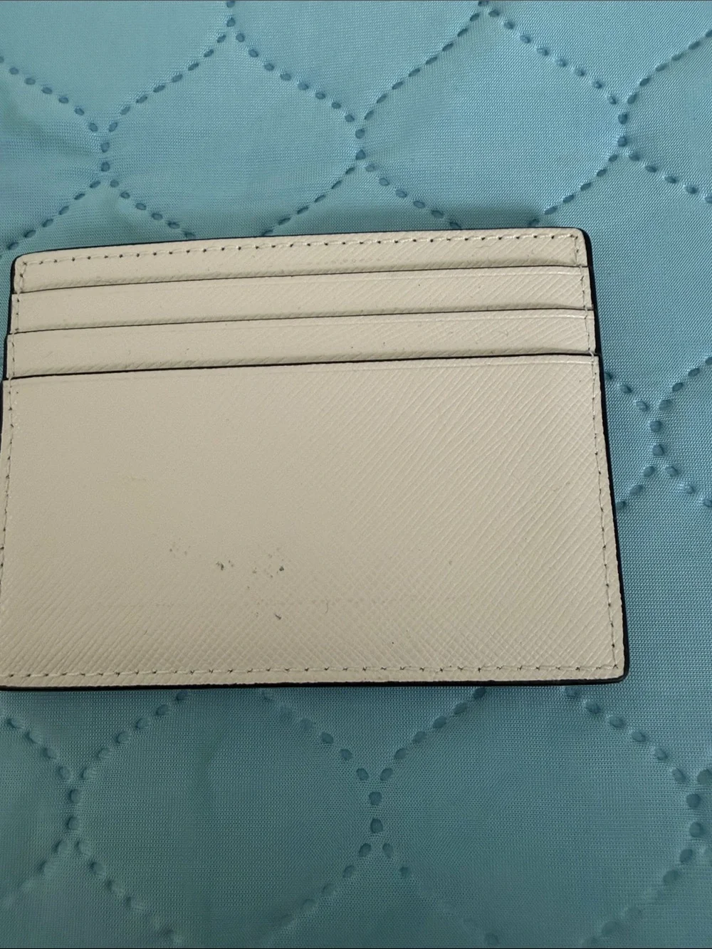 kate spade light pink leather card case with gold logo